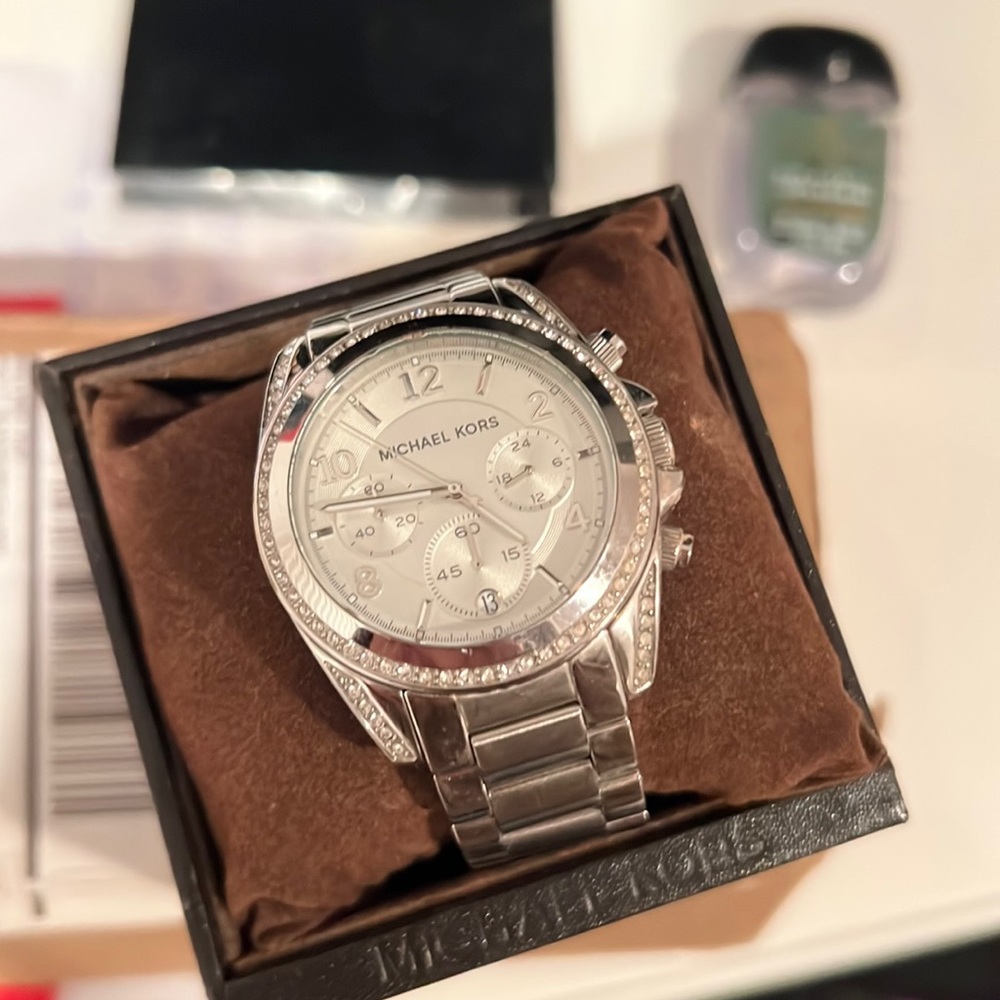 Michael Kors Silver Watch with sparkles around face and extra links-lightly warn